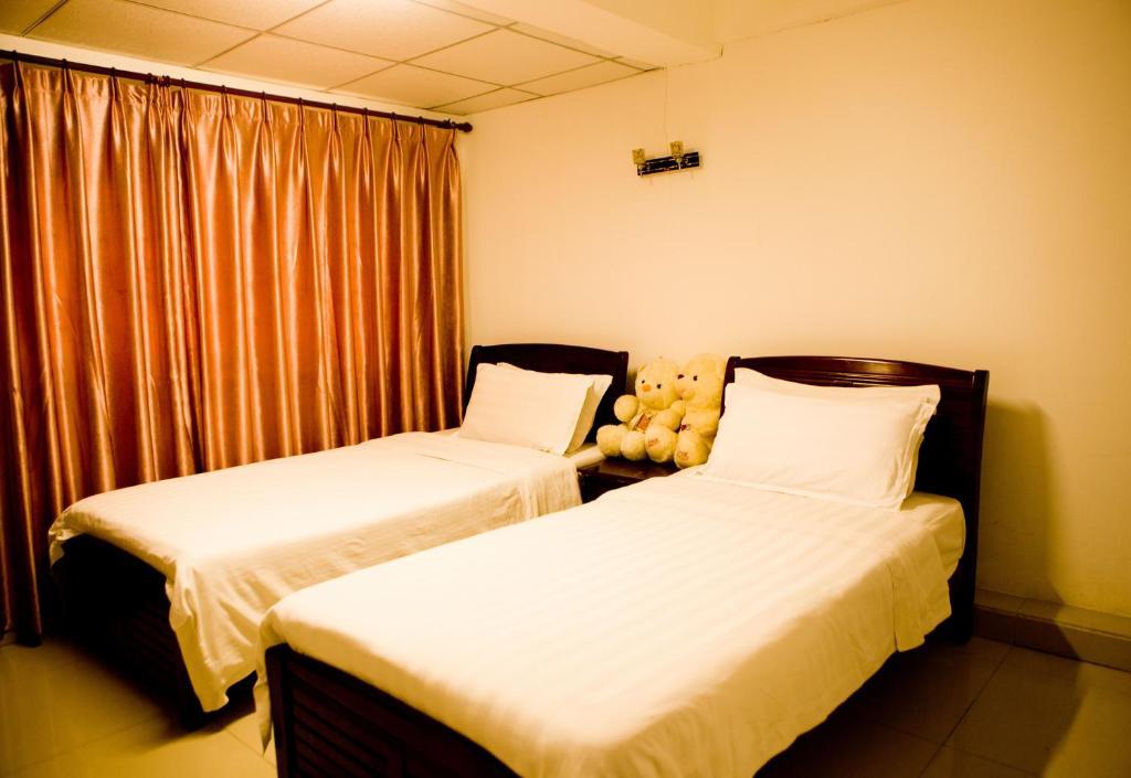 Sanya Hairulan Hotel Værelse billede